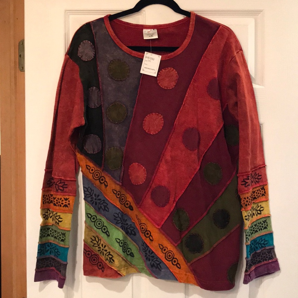 L/XL new with tags The Greater Good top